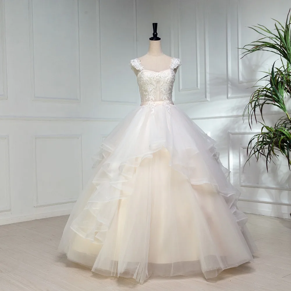 Vivian's Bridal High-low Ruffles Tulle Wedding Gown 2019 Spaghetti Straps Sweetheart Backless Fluffy Vintage Bridal Ball Gown
Vivian's Bridal High-low Ruffles Tulle Wedding Gown 2019 Spaghetti Straps Sweetheart Backless Fluffy Vintage Bridal Ball Gown