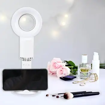 Portable Mini Leafless Fan Handheld 3 Speed Adjustable USB Charging Air Cooling Fan with Beauty Light Mobile Phone Holder
Portable Mini Leafless Fan Handheld 3 Speed Adjustable USB Charging Air Cooling Fan with Beauty Light Mobile Phone Holder