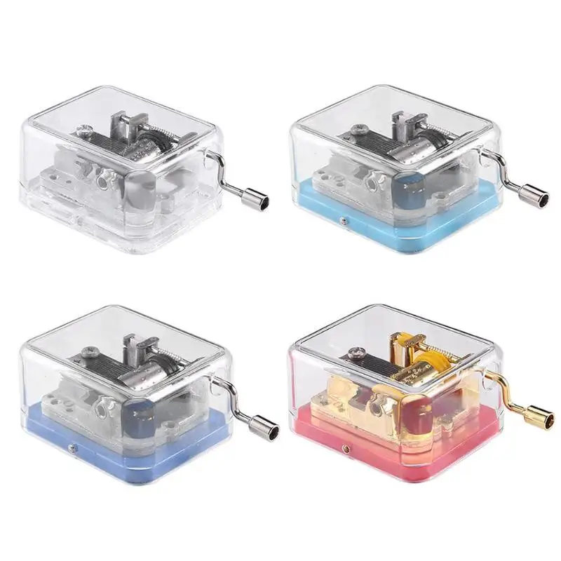 Metal Plastic Music Box Exquisite Square Gold Transparent Wind Up Clockwork Hand Shake Music Box Creative Birthday Gift 
Metal Plastic Music Box Exquisite Square Gold Transparent Wind Up Clockwork Hand Shake Music Box Creative Birthday Gift