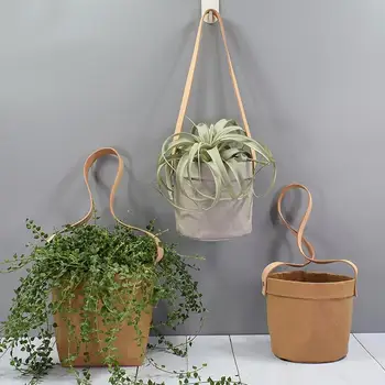 Innovative Washable Kraft Paper Hanging Flower Pots with Leather Hand Strap for Orchid Green Plant Succulents Flower Pots
Innovative Washable Kraft Paper Hanging Flower Pots with Leather Hand Strap for Orchid Green Plant Succulents Flower Pots