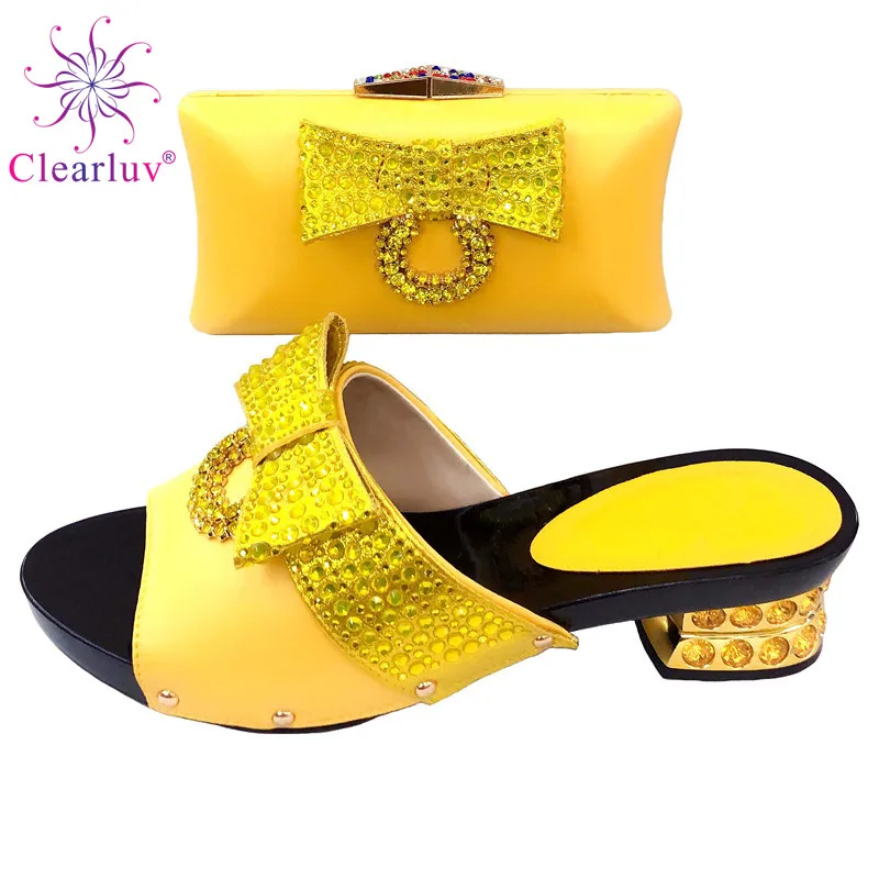 African Yellow Color 2019 Wedding Shoes And Bag Matching Set With Stones Pointed Toe Shoes Women Italian Shoes And Bag For Party
African Yellow Color 2019 Wedding Shoes And Bag Matching Set With Stones Pointed Toe Shoes Women Italian Shoes And Bag For Party