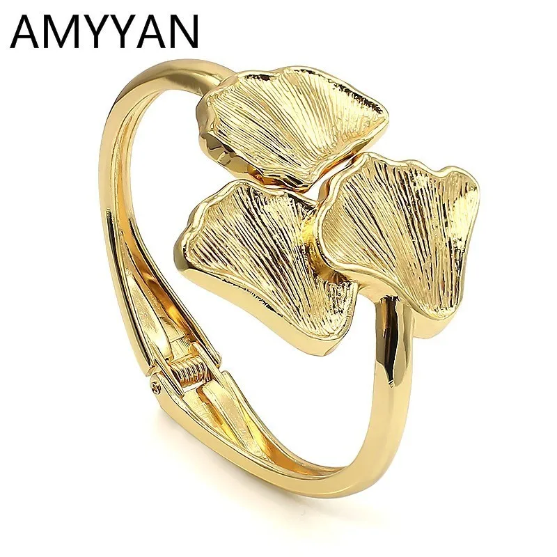 Stainless Steel Ladies Bracelet Bangle Simple Gold Silver Ginkgo Leaf Design Movement Open bracelet Spring Switch
Stainless Steel Ladies Bracelet Bangle Simple Gold Silver Ginkgo Leaf Design Movement Open bracelet Spring Switch