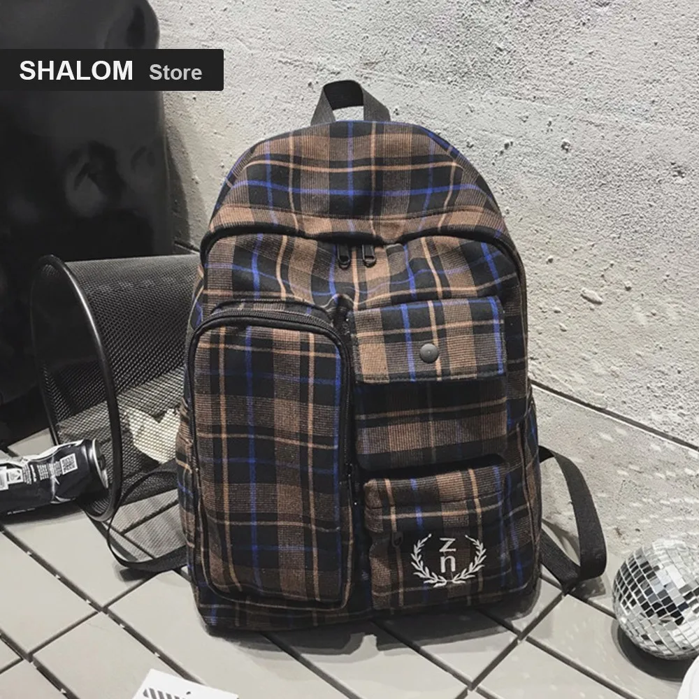 Korean version of the backpack Harajuku fashion casual junior high school students plaid bag backpack(SHALOM)
Korean version of the backpack Harajuku fashion casual junior high school students plaid bag backpack(SHALOM)