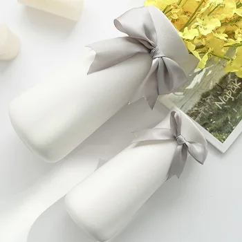 Modern White Ceramic Vase Wedding Decoration With Bowknot Home Vase for Wedding Medium Size Smooth Surface 23cm
Modern White Ceramic Vase Wedding Decoration With Bowknot Home Vase for Wedding Medium Size Smooth Surface 23cm