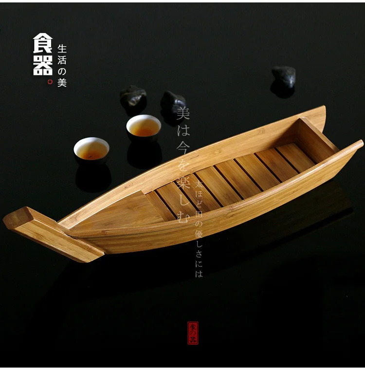 Japanese sushi bamboo boat artistic conception salmon lobster dry ice long cooking boat dish seafood and radish raw fish plate
Japanese sushi bamboo boat artistic conception salmon lobster dry ice long cooking boat dish seafood and radish raw fish plate