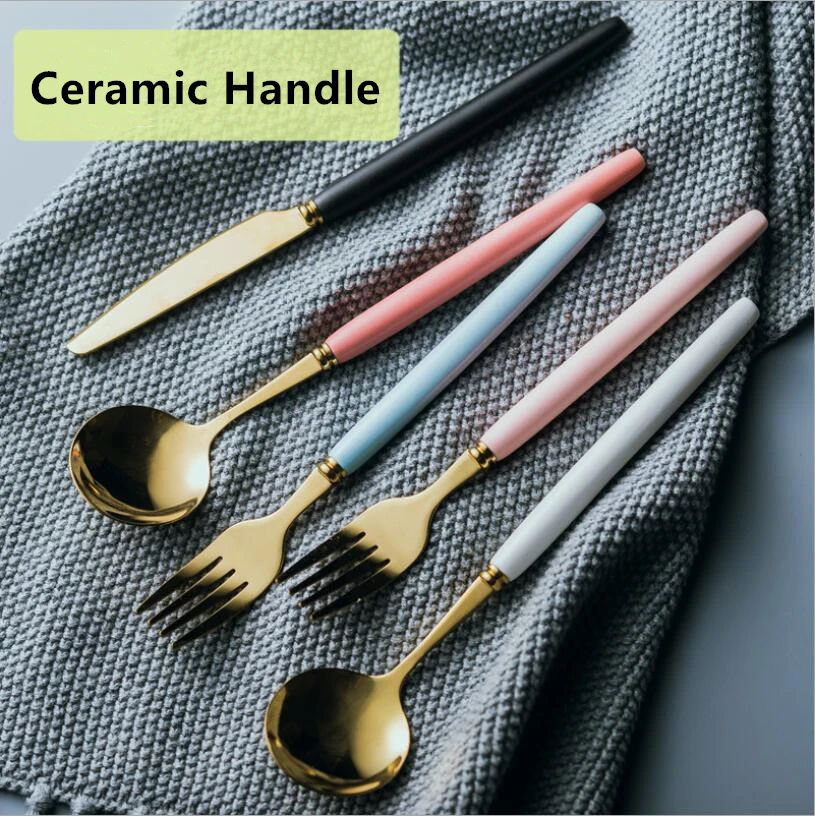 Creative ceramic handle stainless steel knife fork spoon titanium plated tableware white red pink blue black
Creative ceramic handle stainless steel knife fork spoon titanium plated tableware white red pink blue black