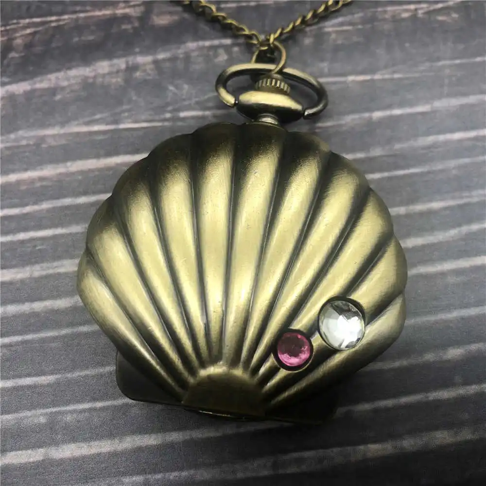 New Arrival Best Selling Vintage Bronze Crystal Shell Shaped Quartz Pocket Watch Necklace Chain Gift for Men Women CF1038
New Arrival Best Selling Vintage Bronze Crystal Shell Shaped Quartz Pocket Watch Necklace Chain Gift for Men Women CF1038