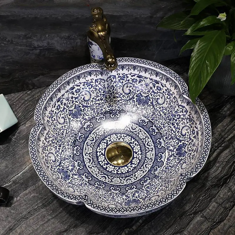 Blue and white porcelain stage basin jingdezhen porcelain wash basin Chinese style stage basin petal art basin
Blue and white porcelain stage basin jingdezhen porcelain wash basin Chinese style stage basin petal art basin