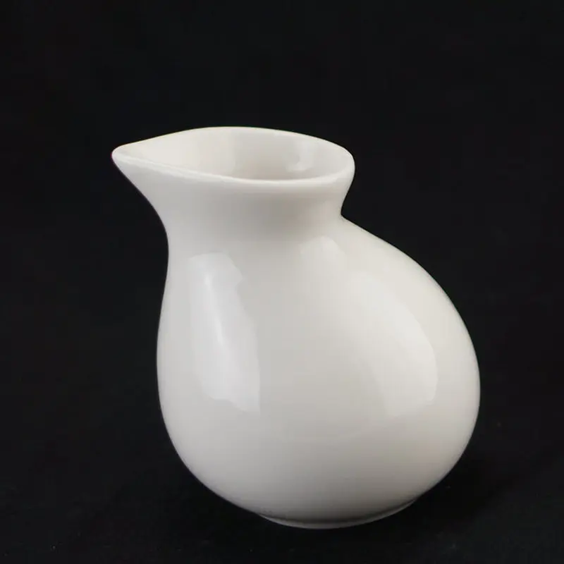 Western restaurant pure white ceramic milk pot bird-shaped milk jug cup honey cup seasoning cup white sugar pot cup lo926202
Western restaurant pure white ceramic milk pot bird-shaped milk jug cup honey cup seasoning cup white sugar pot cup lo926202