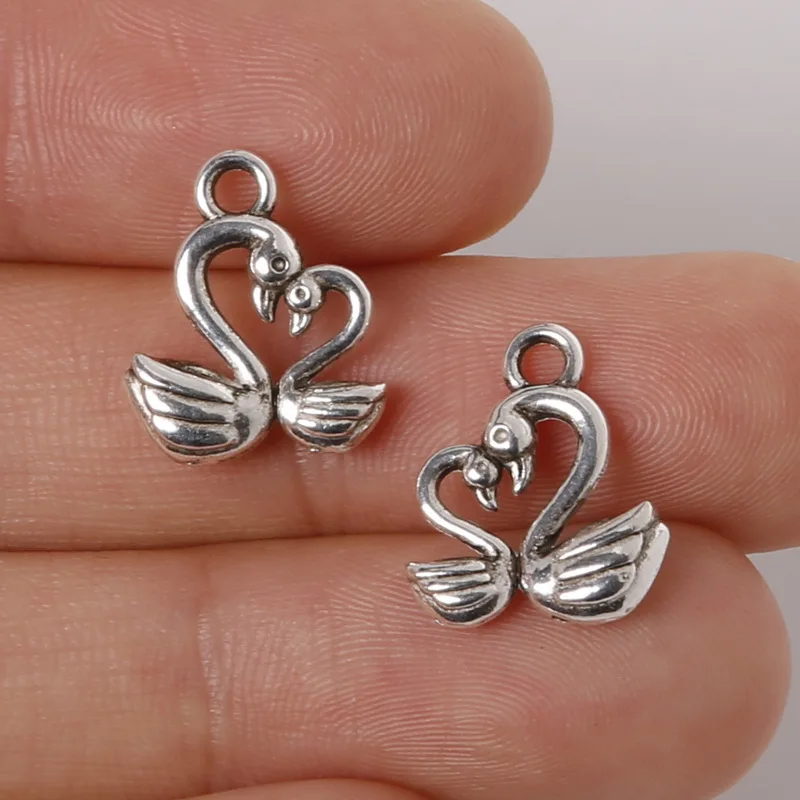 Hot Selling 12pcs 13x15mm Zinc Alloy Antique Silver Plated Swan DIY Charms Pendants For Jewelry Making Findings,Fit Bracelet
Hot Selling 12pcs 13x15mm Zinc Alloy Antique Silver Plated Swan DIY Charms Pendants For Jewelry Making Findings,Fit Bracelet