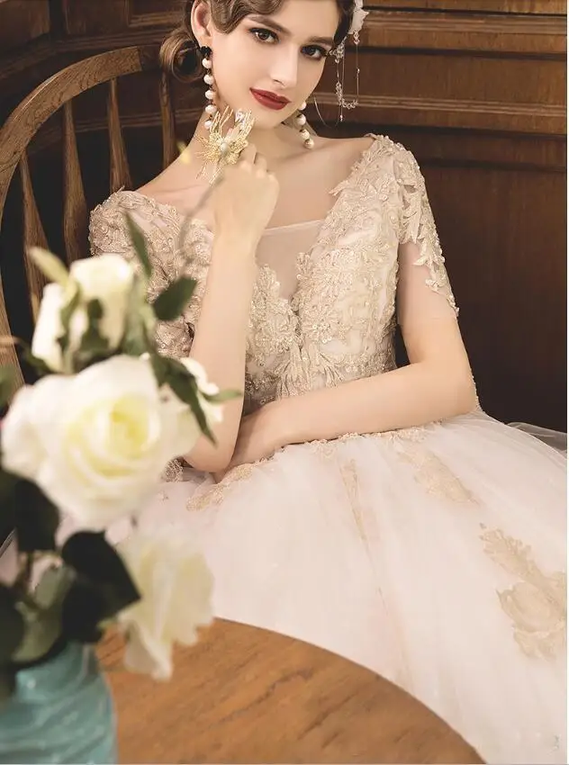short-sleeve-royal-princess-wedding-dresses-a-line-gold-appliques-tulle-bridal-gown-crystal-beading-court-train-bridal-dress-custom-made (3)