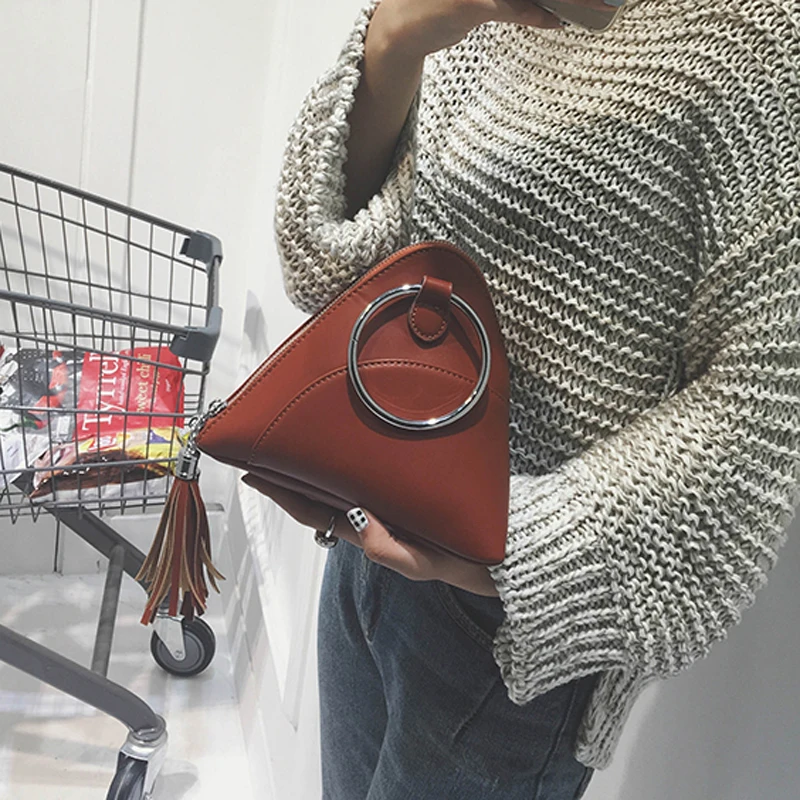 Bag 2019 dumplings package women's handbag mini tassel bag triangle women messenger bags PU
Bag 2019 dumplings package women's handbag mini tassel bag triangle women messenger bags PU