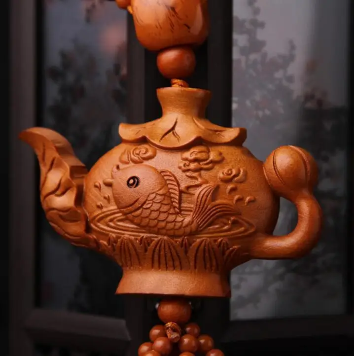 Chinese Peach Wood Carved Double Fish Carp Lotus Flower Lotus Leaf Teapot Exquisite Car Pendant Statue
Chinese Peach Wood Carved Double Fish Carp Lotus Flower Lotus Leaf Teapot Exquisite Car Pendant Statue
