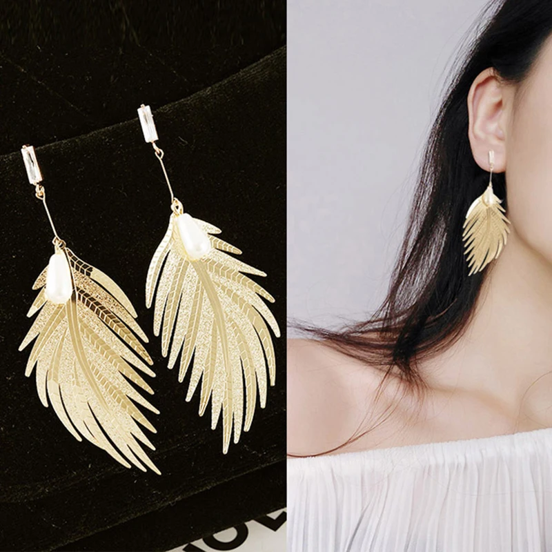 Metal feather ear nail pearl net red temperament simple long style Japanese Korean Fashion Pendant personality bagel Earrings
Metal feather ear nail pearl net red temperament simple long style Japanese Korean Fashion Pendant personality bagel Earrings