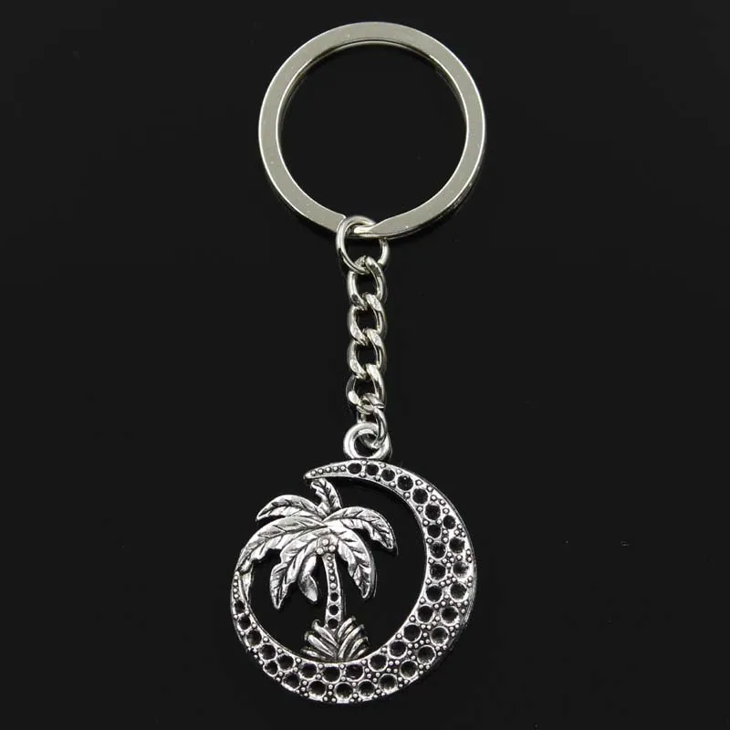 New Keychain 37x30mm palm tree moon coconut Pendants DIY Men Car Key Chain Ring Holder Keyring Souvenir Jewelry Gift
New Keychain 37x30mm palm tree moon coconut Pendants DIY Men Car Key Chain Ring Holder Keyring Souvenir Jewelry Gift