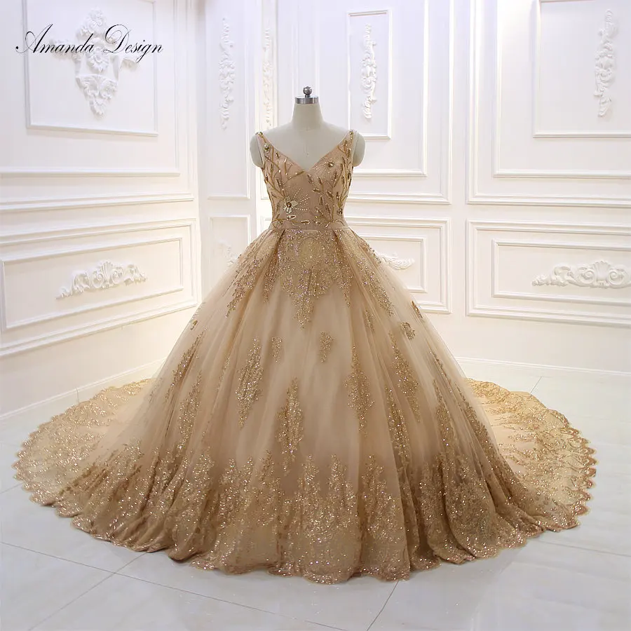 Amanda Design abendkleider 2019 V-Neck Lace Appliqued Beading Gold Wedding Dress with Wraps
Amanda Design abendkleider 2019 V-Neck Lace Appliqued Beading Gold Wedding Dress with Wraps