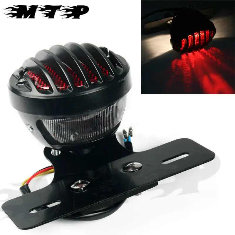 New Retro Style Mesh Fences BLACK GRILL ROUND METAL MOTORCYCLE TAIL BRAKE LIGHT FOR Honda Racer HARLEY BOBBER CHOPPER CUSTOM
New Retro Style Mesh Fences BLACK GRILL ROUND METAL MOTORCYCLE TAIL BRAKE LIGHT FOR Honda Racer HARLEY BOBBER CHOPPER CUSTOM