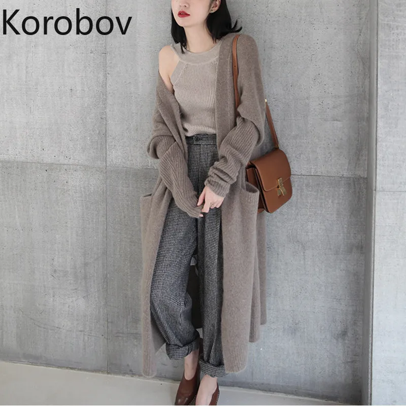 Korobov Autumn New Women Long Solid Cardigan Korean Oversize Sweaters Female Knitted Sweater Pockets Sueter Mujer 78418
Korobov Autumn New Women Long Solid Cardigan Korean Oversize Sweaters Female Knitted Sweater Pockets Sueter Mujer 78418