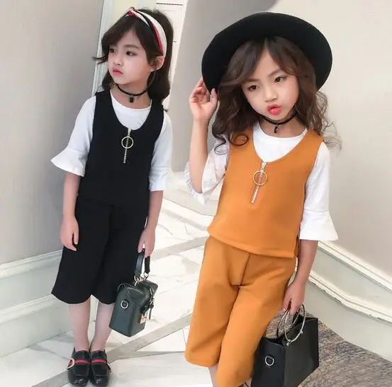Casual Clothes For Girls Girls Summer Solid Color Flare Sleeve O-neck Cotton Tops Formal Pirate Shorts Suits Conjunto Menina
Casual Clothes For Girls Girls Summer Solid Color Flare Sleeve O-neck Cotton Tops Formal Pirate Shorts Suits Conjunto Menina