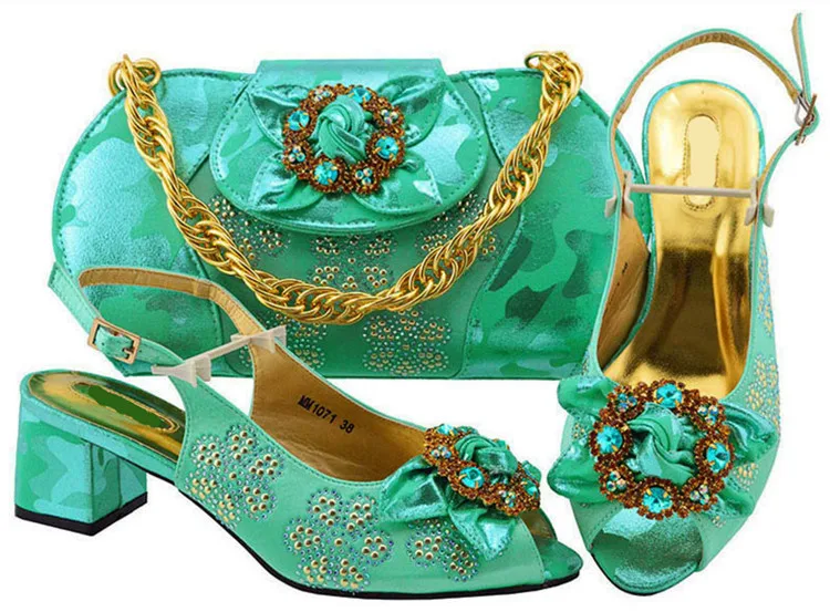 Top sale water green women kitten heel shoes with crystal flower design african shoes match handbag set MM1071,heel 5.8CM
Top sale water green women kitten heel shoes with crystal flower design african shoes match handbag set MM1071,heel 5.8CM