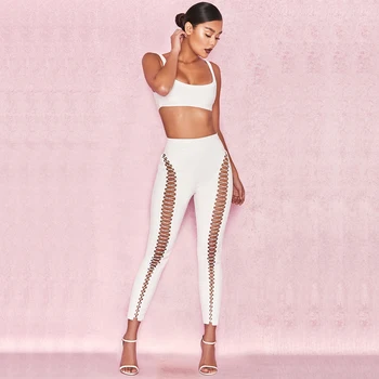New Sexy Hollow Out 2 Two Piece Set Jumpsuit Women Celebrity Night Party Runway Spaghetti Strap Short Top Long PU Learther Pants
New Sexy Hollow Out 2 Two Piece Set Jumpsuit Women Celebrity Night Party Runway Spaghetti Strap Short Top Long PU Learther Pants