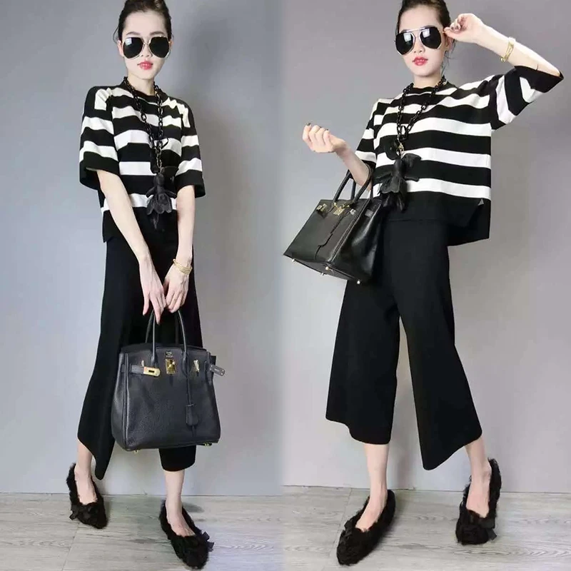 2 Pieces New Spring Summer Women's Pants Suits Loose Design Kniting Casual Stripped Tops And Black Wide Leg Pants Suit NS244
2 Pieces New Spring Summer Women's Pants Suits Loose Design Kniting Casual Stripped Tops And Black Wide Leg Pants Suit NS244