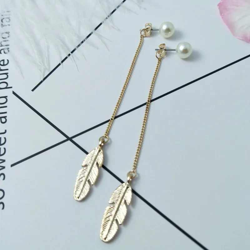 Vintage fashion Simulated Pearls Long Tassel Dangle Earrings For Women Leaves Feather Pendant Earrings Jewelry
Vintage fashion Simulated Pearls Long Tassel Dangle Earrings For Women Leaves Feather Pendant Earrings Jewelry