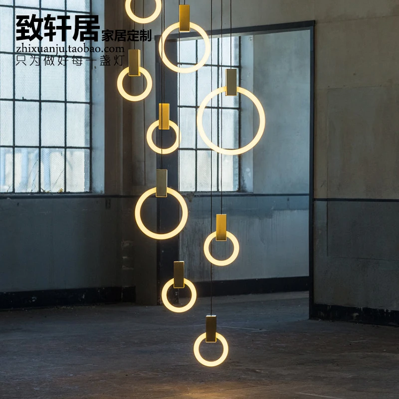 To hin in Scandinavian minimalist designer rings droplight torch personality stairs art lamp ring chandeliers
To hin in Scandinavian minimalist designer rings droplight torch personality stairs art lamp ring chandeliers