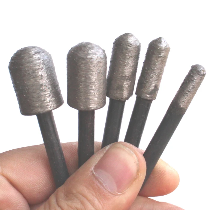 6mm Shank 6pcs T shape + 6pcs Mix Size Round Head Cylindrical Sintered Diamond Grinding Head Gravestone Marble Stone Carving
6mm Shank 6pcs T shape + 6pcs Mix Size Round Head Cylindrical Sintered Diamond Grinding Head Gravestone Marble Stone Carving
