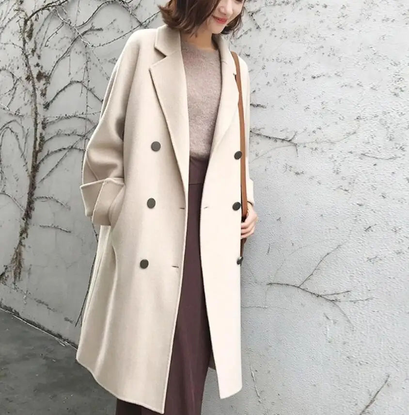 Woolen coat female long section Korean version lapel double-breasted windproof loose double-sided woolen coat's
Woolen coat female long section Korean version lapel double-breasted windproof loose double-sided woolen coat's