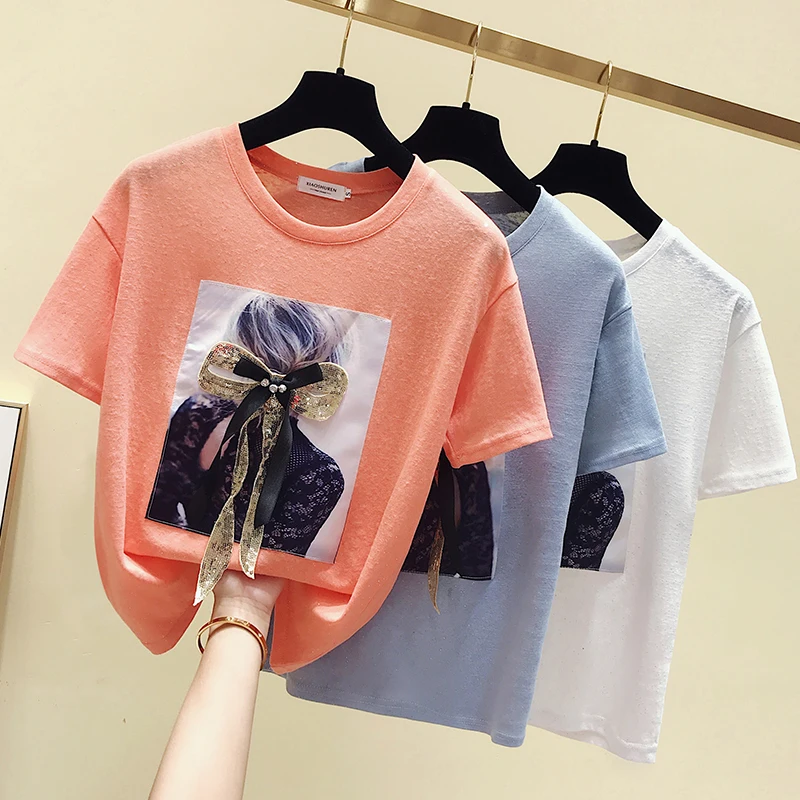 2019 Summer Women's T-shirt Loose Round Collar Character Print Bow Beads Female Tees Korean fashion Leisure Short Sleeve Tops
2019 Summer Women's T-shirt Loose Round Collar Character Print Bow Beads Female Tees Korean fashion Leisure Short Sleeve Tops
