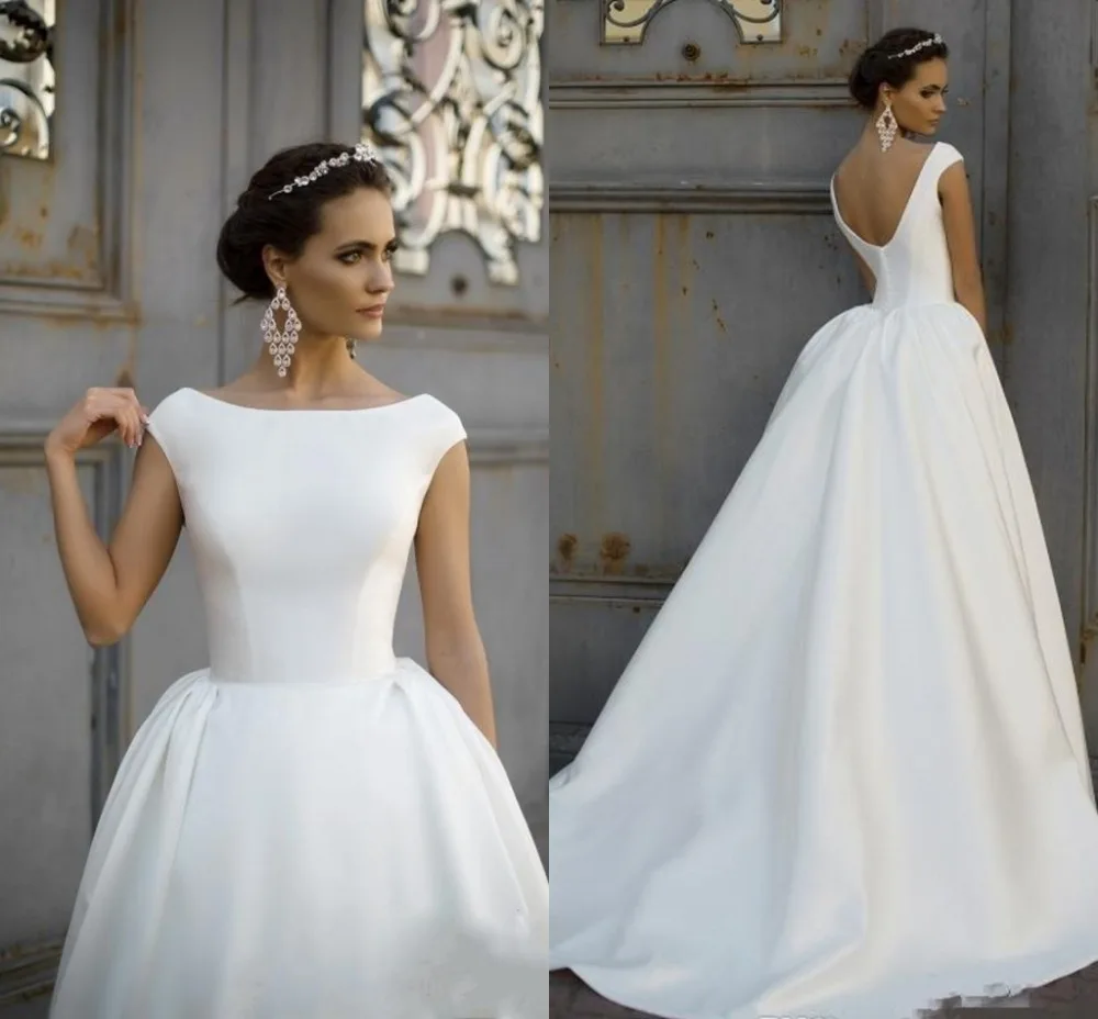 robe de mariee 2020 Vintage Boat Neck Satin Wedding Dress Backless Button A-line Princess Bridal Gowns Train vestidos
robe de mariee 2020 Vintage Boat Neck Satin Wedding Dress Backless Button A-line Princess Bridal Gowns Train vestidos