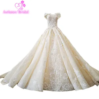 2018 Champagne Natural White Lace Wedding Dresses Sleeveless Long Train Waves Ball Gown Bridal Gowns Trouwjurk Vestido De Noiva
2018 Champagne Natural White Lace Wedding Dresses Sleeveless Long Train Waves Ball Gown Bridal Gowns Trouwjurk Vestido De Noiva