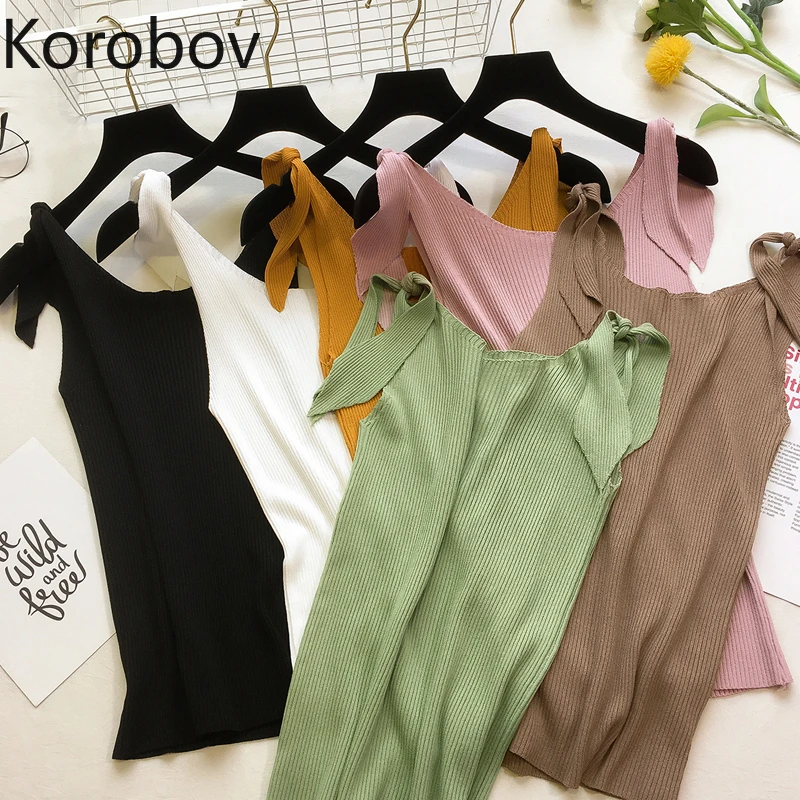 Korobov Korean Solid Elegant Lacing Bow Off Shoulder Women Tank Top Slim Knit Sleeveless V Neck Vogue Camis Tops 77828
Korobov Korean Solid Elegant Lacing Bow Off Shoulder Women Tank Top Slim Knit Sleeveless V Neck Vogue Camis Tops 77828