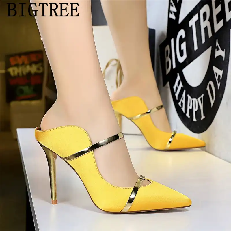 yellow and black high heels