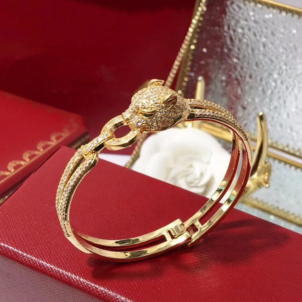 Brand 2018 new Version copper plaed gold Leopard bracelet bangle with full cz stones panther head bracelet high quality
Brand 2018 new Version copper plaed gold Leopard bracelet bangle with full cz stones panther head bracelet high quality