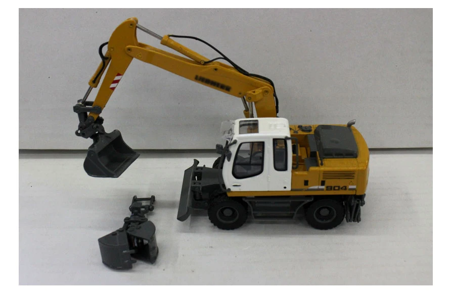 rare Special Offer 1:50 German A904C Model of alloy wheel excavator Replaceable grab Collection
rare Special Offer 1:50 German A904C Model of alloy wheel excavator Replaceable grab Collection