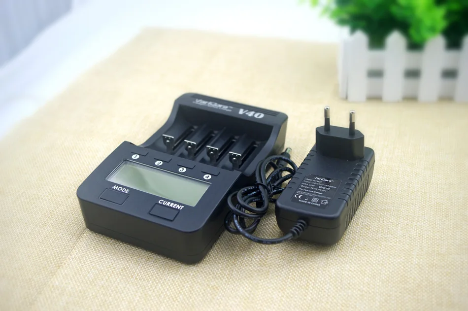2016 VariCore V40 3.7 B 18650 26650 18350 16340 18500 25500 10440 17500. NiMH 1.2 The AA AAA 5V output LCD battery charger
2016 VariCore V40 3.7 B 18650 26650 18350 16340 18500 25500 10440 17500. NiMH 1.2 The AA AAA 5V output LCD battery charger