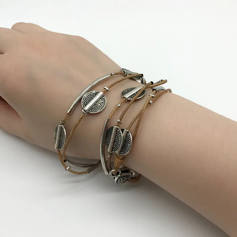New fashion retro long leather rope, hand woven bracelet, round relief alloy, primitive tribal style B035
New fashion retro long leather rope, hand woven bracelet, round relief alloy, primitive tribal style B035