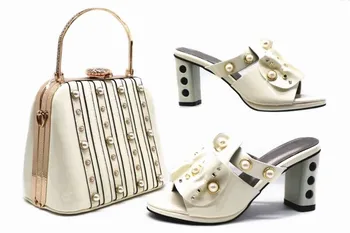 Hot sale white women pumps with pearl decoration african shoes match big handbag set for dress X36,heel 8CM
Hot sale white women pumps with pearl decoration african shoes match big handbag set for dress X36,heel 8CM