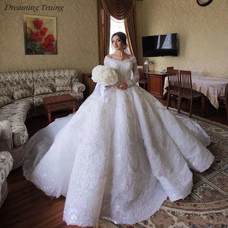 Luxury Sparkling Crystals Wedding Dresses With Lace Long Sleeve High Quality Bride Ball Gown Arabic Dubai Wedding Dress Mariage
Luxury Sparkling Crystals Wedding Dresses With Lace Long Sleeve High Quality Bride Ball Gown Arabic Dubai Wedding Dress Mariage