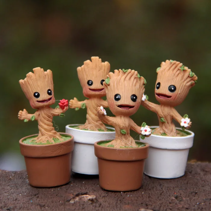 Mini 4PCS Tree man Grootted Doll With Pot Toys Guardians Galaxy Baby Treeman Miniature Model Statue Toys Action Figure Toys
Mini 4PCS Tree man Grootted Doll With Pot Toys Guardians Galaxy Baby Treeman Miniature Model Statue Toys Action Figure Toys