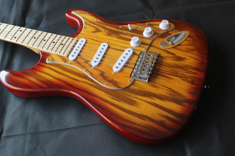 Striped ST electric guitar, suitcase, good quality free delivery, welcome to customize
Striped ST electric guitar, suitcase, good quality free delivery, welcome to customize