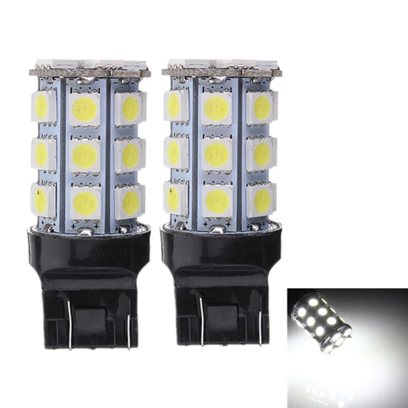 2Pcs Auto flash LED T20 W21/5W 7443 5050 27 SMD White Red W3x16q 12V Car flashing Front Tail Lamp Turn Brake DRL Fog Light.
2Pcs Auto flash LED T20 W21/5W 7443 5050 27 SMD White Red W3x16q 12V Car flashing Front Tail Lamp Turn Brake DRL Fog Light.