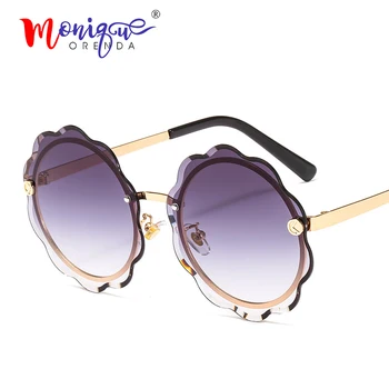 Luxury rimless sunglasses women vintage brand designer flower edge wave sun glasses men female shade oculos de sol UV400
Luxury rimless sunglasses women vintage brand designer flower edge wave sun glasses men female shade oculos de sol UV400