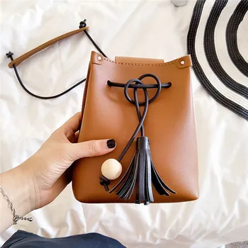 1PC New Fashion Mini Bucket Bag Tassel Handbag Simple Shoulder Messenger Bag Wild Small Bag Shoulder Bag
1PC New Fashion Mini Bucket Bag Tassel Handbag Simple Shoulder Messenger Bag Wild Small Bag Shoulder Bag