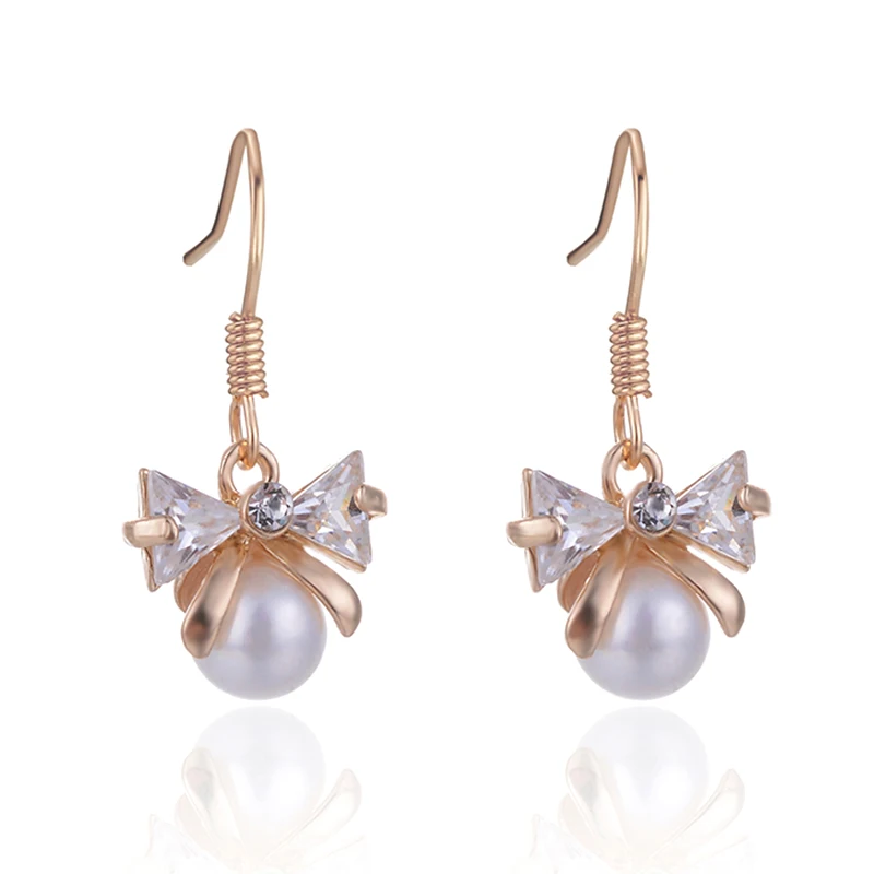 SUKI Korean Japanese Bowknot Pearl Zircon Crystal Statement Hooks Dangle Wedding Earrings for Women Jewelry Pendant Drop Earring
SUKI Korean Japanese Bowknot Pearl Zircon Crystal Statement Hooks Dangle Wedding Earrings for Women Jewelry Pendant Drop Earring