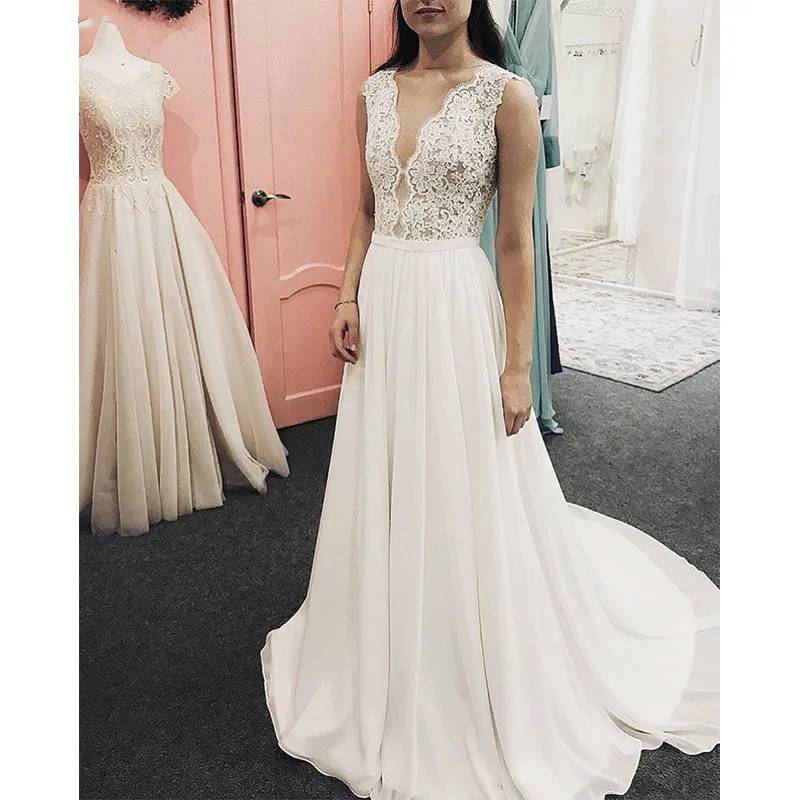 Boho A-line Wedding Dress Sexy V-neck Sleeveless Chiffon Beach Bridal Dress Full Length Vestido De Novia Lace Robe De Mariee
Boho A-line Wedding Dress Sexy V-neck Sleeveless Chiffon Beach Bridal Dress Full Length Vestido De Novia Lace Robe De Mariee