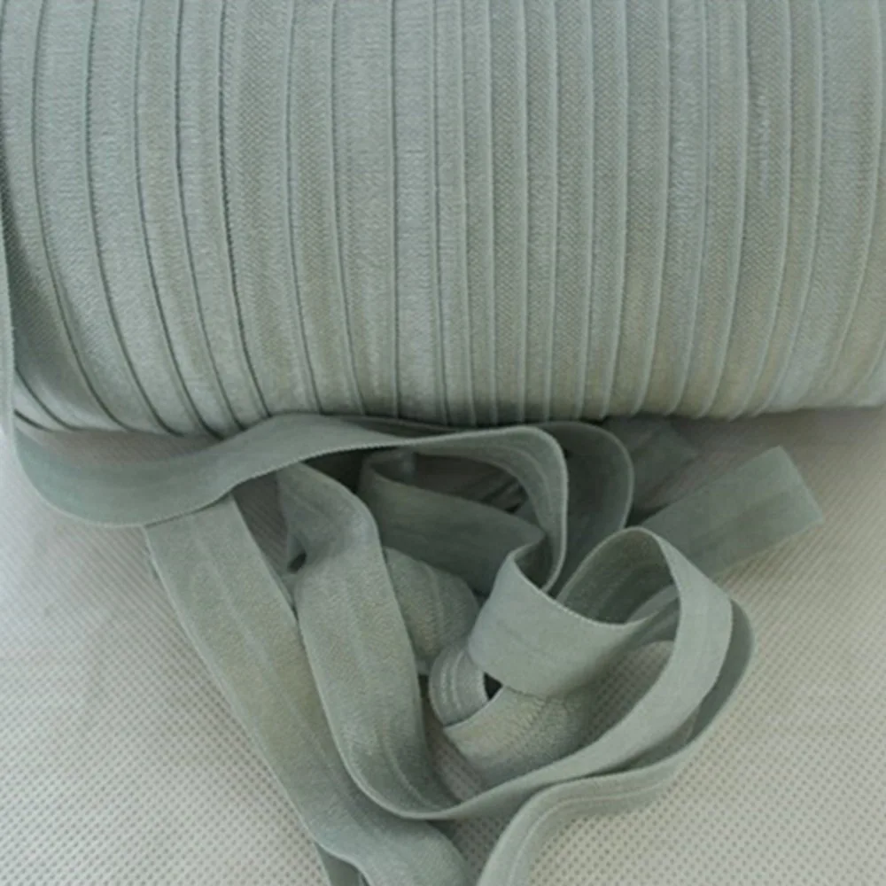 T.R RIBBON #009 light silver 5/8" Solid Color FOE Fold over elastic Ribbon for headwear accessoriess 50yards and 100yards/lot
T.R RIBBON #009 light silver 5/8" Solid Color FOE Fold over elastic Ribbon for headwear accessoriess 50yards and 100yards/lot