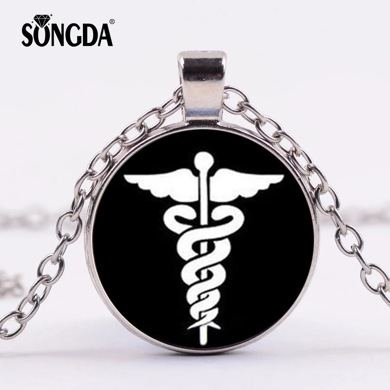 SONGDA New Snake Caduceus Medical Symbol Necklace Double Snakes Wings Magic Wand Photo Nurse Doctor Glass Jewelry Men Women Gift
SONGDA New Snake Caduceus Medical Symbol Necklace Double Snakes Wings Magic Wand Photo Nurse Doctor Glass Jewelry Men Women Gift
